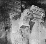 partial image of painting showing top of decayed temple in black and white