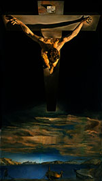 above-the-head view of a man on a cross, surrounded in darkness. He is looking down on the earth and sky