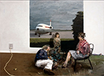 A man is lying on the ground looking up at a woman in a pink blouse and white skirt who is seated on a chair. A small child wearing brown in the background stands in front of either a window or a painting on the wall showing an airplane and a blue sky.