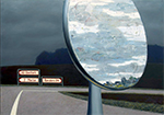 The rearview mirror of a car showing a lighter sky with clouds that contrasts with the darker sky and dark shapes facing foward. A road streaches in the fore to mid ground