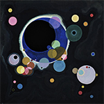 a large blue and black circle with dozens of other smaller ones in different sized scattered around. Black background. abstract